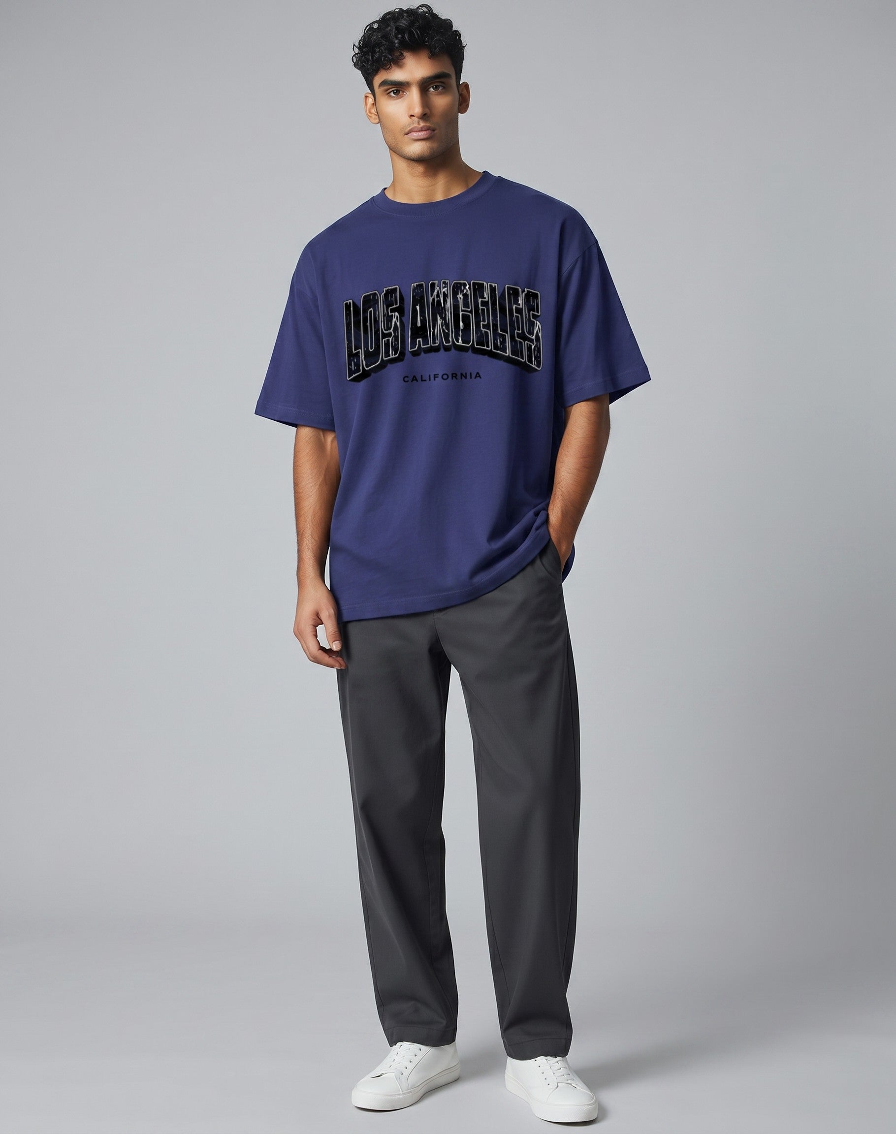 Tribe Neo 91 oversized navy blue cotton t-shirt with distressed Los Angeles cityscape graphic on a male model