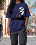 Tribe Neo 91 royal blue oversized cotton t-shirt with lion and Japanese landscape graphic on a woman in a city street