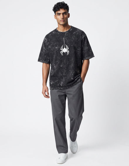 Tribe Neo 91 black acid wash oversized cotton t-shirt with a white spider graphic worn by a male model