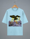 Tribe Neo 91 light blue oversized cotton t-shirt featuring a comic-style UFO alien invasion graphic print.