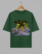 Tribe Neo 91 oversized green cotton t-shirt featuring a comic-style UFO alien invasion graphic print.