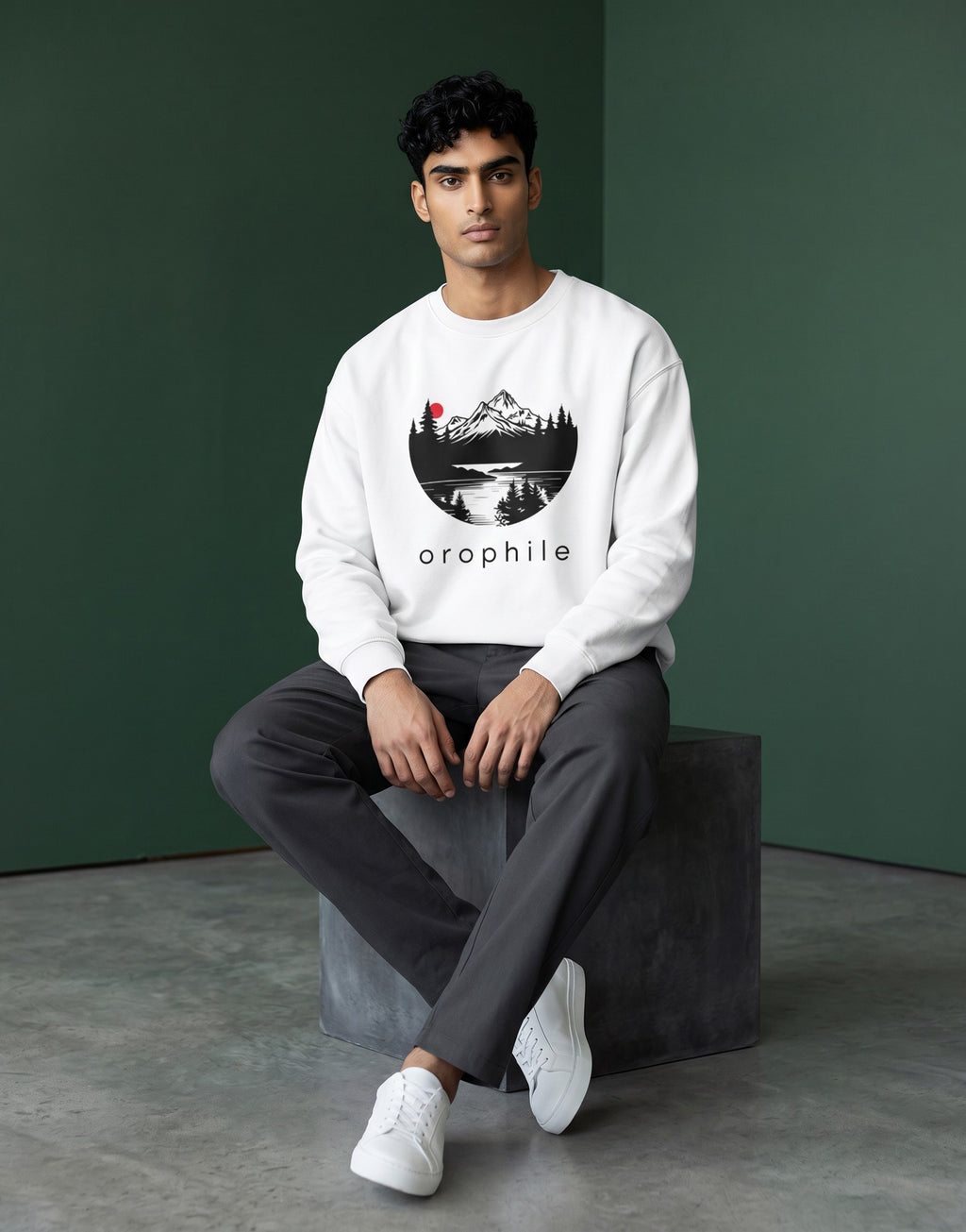 Tribe Neo 91 white oversized sweatshirt featuring a circular mountain landscape graphic with a red sun on a male model.