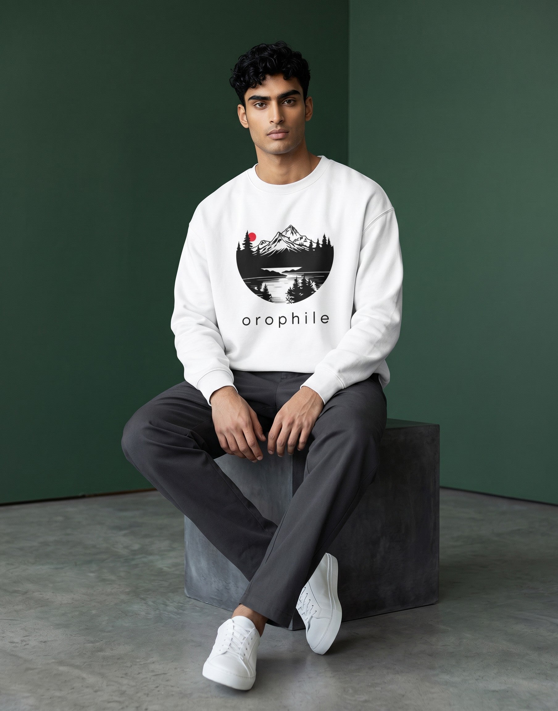 Tribe Neo 91 white oversized sweatshirt featuring a circular mountain landscape graphic with a red sun on a male model.