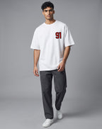 Tribe Neo 91 white oversized heavyweight cotton t-shirt with red and black 91 print on chest worn by a male model