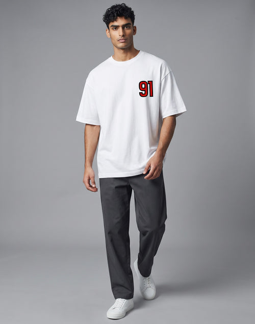 Tribe Neo 91 white oversized heavyweight cotton t-shirt with red and black 91 print on chest worn by a male model
