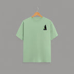 Witch Cauldron graphic t-shirt on JADE-GREEN unisex 100% cotton crew neck, subtle charming witch and cauldron graphic on chest, unique eye-catching magic detail, DTG print 300 DPI, 180 GSM breathable soft fabric