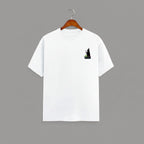 Witch Cauldron graphic t-shirt on WHITE unisex 100% cotton crew neck, subtle charming witch and cauldron graphic on chest, unique eye-catching magic detail, DTG print 300 DPI, 180 GSM breathable soft fabric