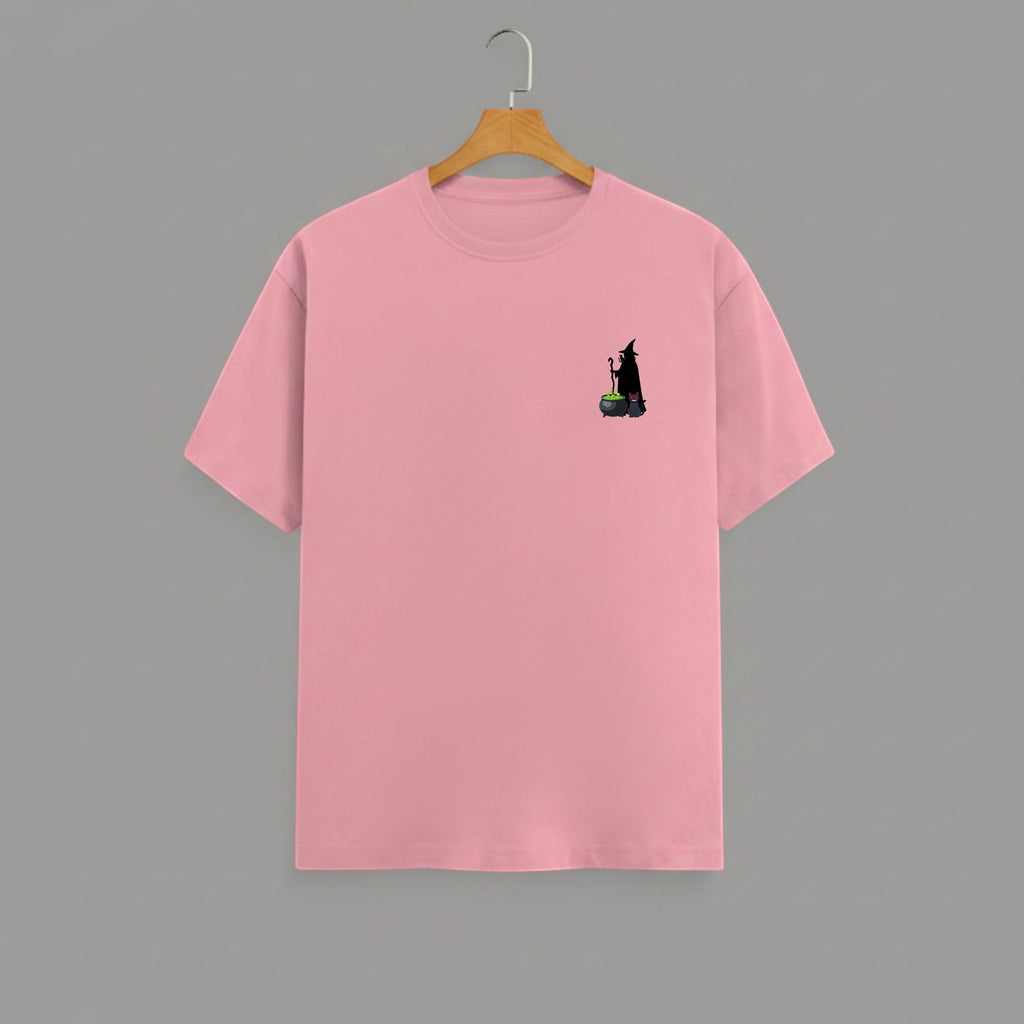 Witch Cauldron graphic t-shirt on FLAMINGO unisex 100% cotton crew neck, subtle charming witch and cauldron graphic on chest, unique eye-catching magic detail, DTG print 300 DPI, 180 GSM breathable soft fabric