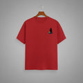 Witch Cauldron graphic t-shirt on RED unisex 100% cotton crew neck, subtle charming witch and cauldron graphic on chest, unique eye-catching magic detail, DTG print 300 DPI, 180 GSM breathable soft fabric