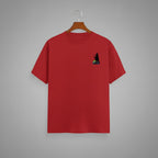 Witch Cauldron graphic t-shirt on RED unisex 100% cotton crew neck, subtle charming witch and cauldron graphic on chest, unique eye-catching magic detail, DTG print 300 DPI, 180 GSM breathable soft fabric